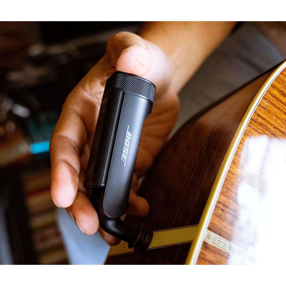 Bose S1 Pro+ wireless instrument transmitter angled product shot showing aluminum housing