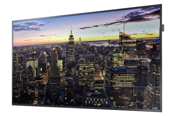 An industrial 49 inch Samsung QM49F multi-screen monitor displaying four synchronized 1080p security telemetry video feeds inside a corporate control center