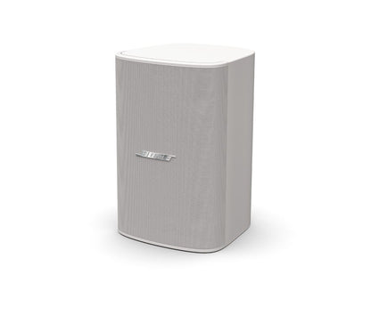 Bose DM6SE surface mount loudspeaker installed outdoors on a wall bracket