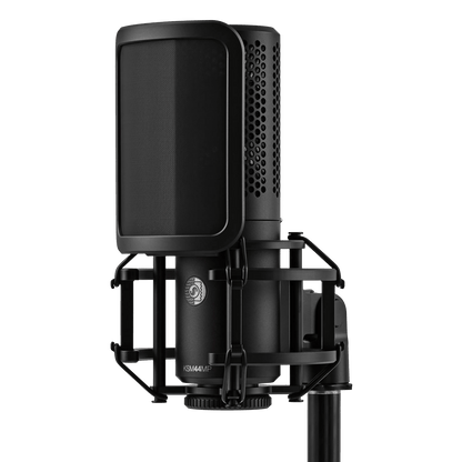 Shure KSM44MP with pop filter attached in shock mount on a stand