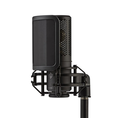 Shure KSM32C with magnetic pop filter attached in shock mount