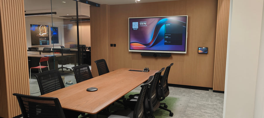 Eight hybrid meeting rooms, three floors, one AV ecosystem
