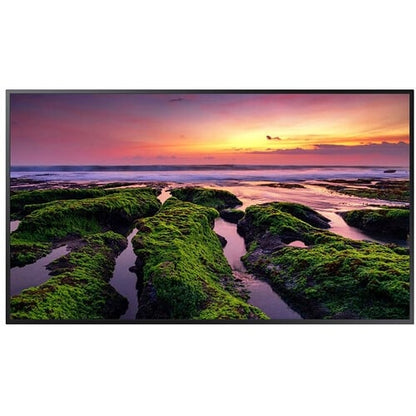 Samsung QB65B 65 inch Crystal UHD 4K signage display featuring an ultra-slim 28.5mm chassis and 16/7 industrial runtime. Professional hardware available for B2B procurement in Dubai and Abu Dhabi via Trianze Tech.